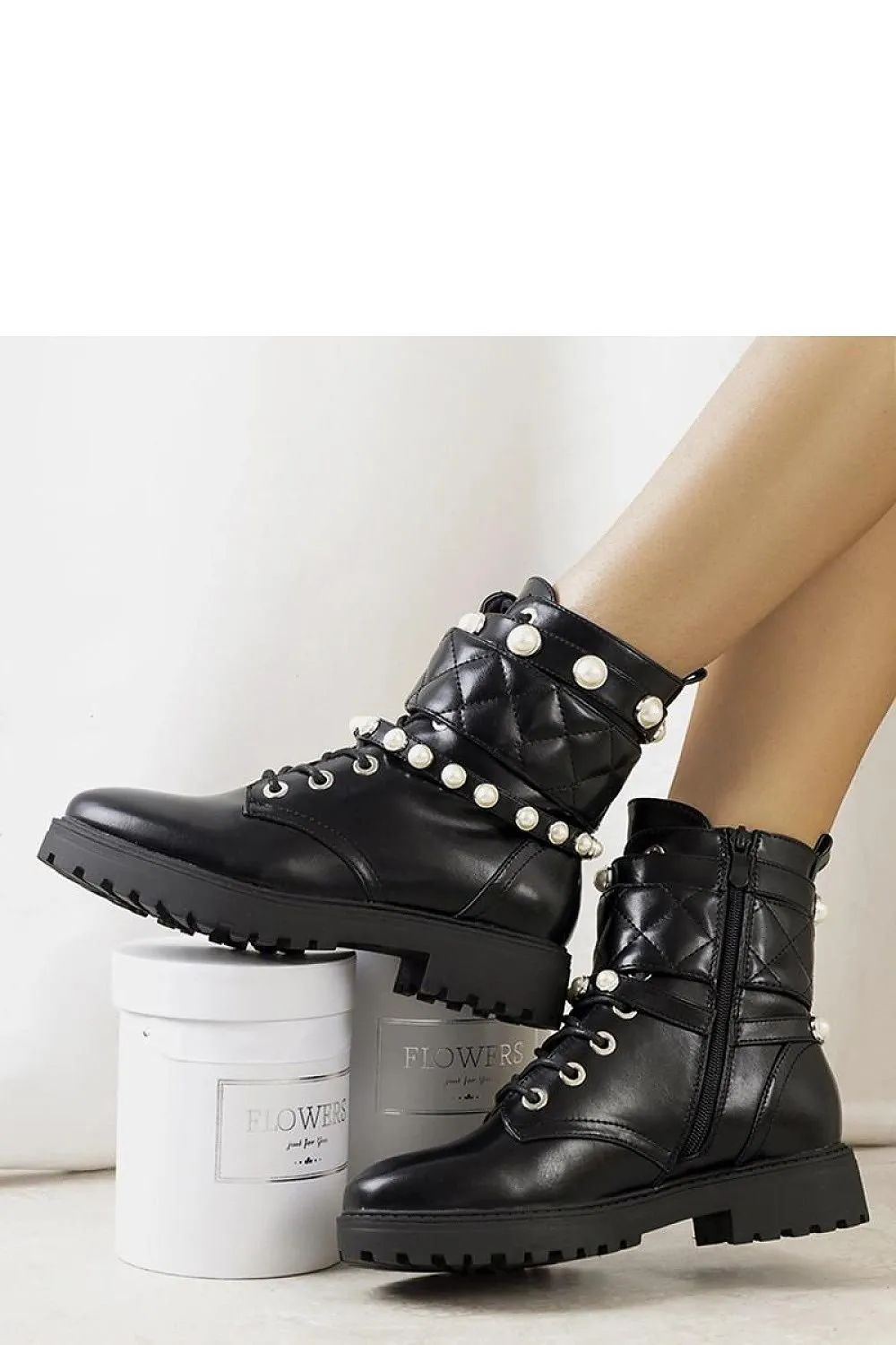Black synthetic leather boots